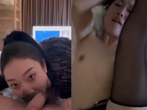 Em trang điểm đậm, búi tóc cao mút cò anh vô cùng sexy.